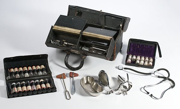 Leather Doctor's Bag, : Leather Doctor's Bag, that folds open to reveal three compartments. Includes two leather medicine wallets with 20 and 11 items in them. PLUS several bone chisels, anesthesia masks, stethoscopes, ref