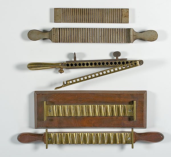Lot of Suppository Molds and Pill Rollers, : Lot of Suppository Molds and Pill Rollers, lot of three includes one wood-handled brass suppository press on wood base, which measures 11.75" in length. Press has 24 slots in it. PLUS one brass supp