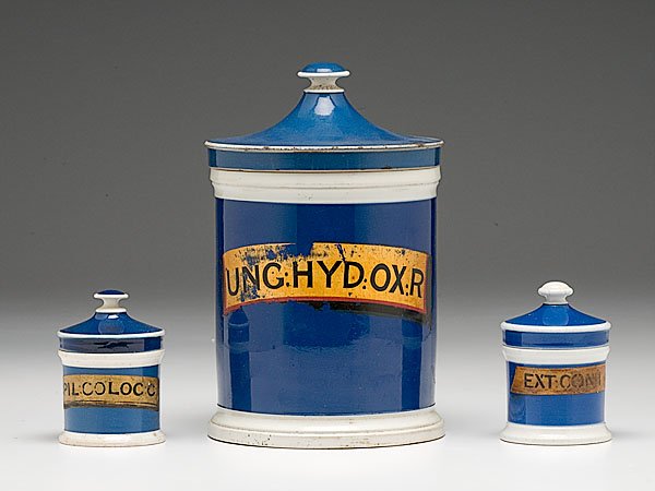 Lot of Creamware Apothecary Jars, : Lot of Creamware Apothecary Jars, early to mid-19th century. Lot of three English cobalt-glazed creamware apothecary jars impressed with gold, black, and red labels. Lot includes one large jar measu
