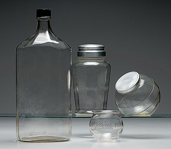 Counter Top Glass Display Jars, : Counter Top Glass Display Jars, lot of 4 counter top glass display jars. Includes a 10-sided glass jar with aluminum top reading Aridor. Measures 11.25" tall. PLUS a fishbowl-shaped jar reading From