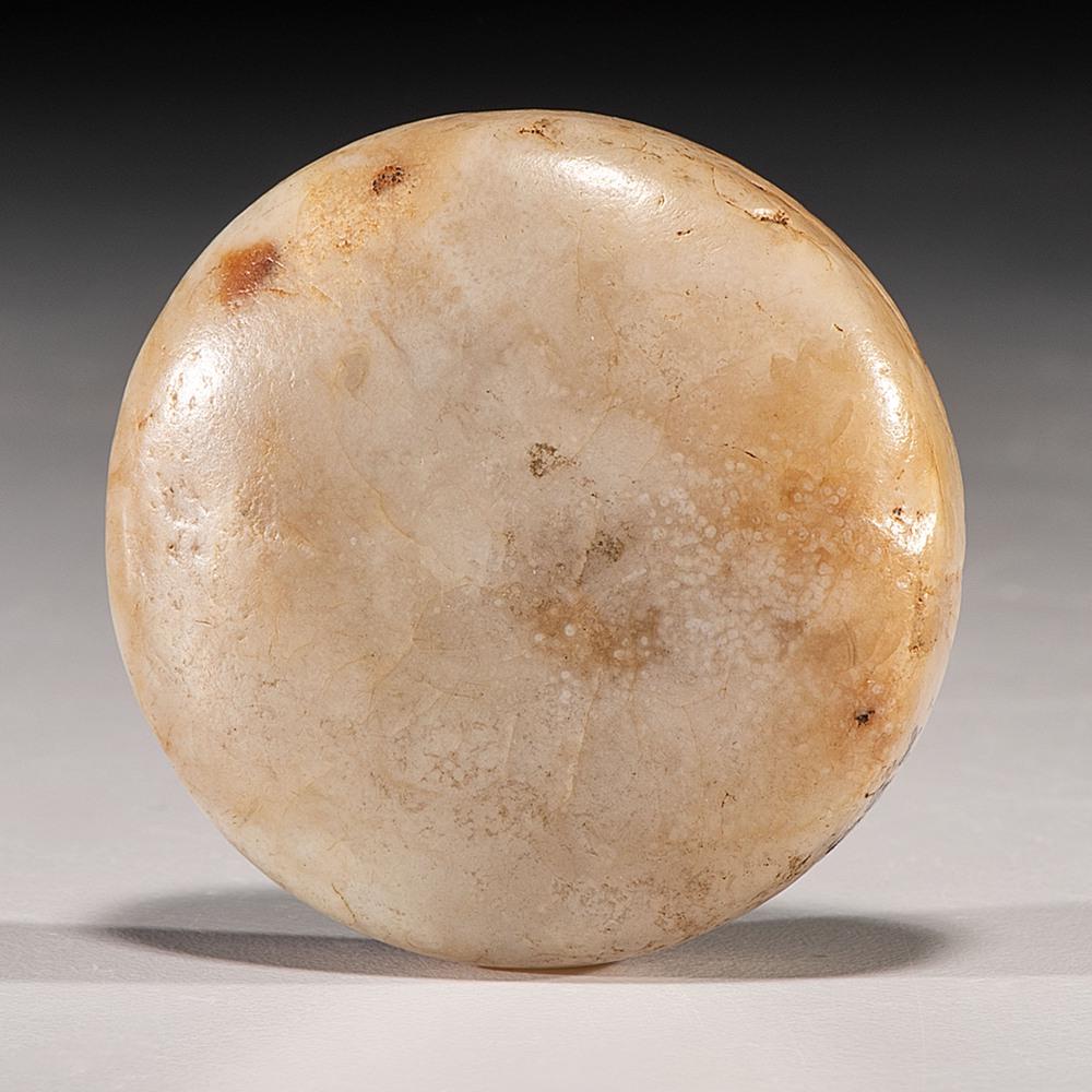 A Flint Biscuit Discoidal, 2 in.: Mississippian Culture, Late Prehistoric Period, A.D 100-1500 Arkansas diameter 2 in. Published: Gerber, Art, The Art Gerber Story, 2007, pg. 186, fig. 0.126