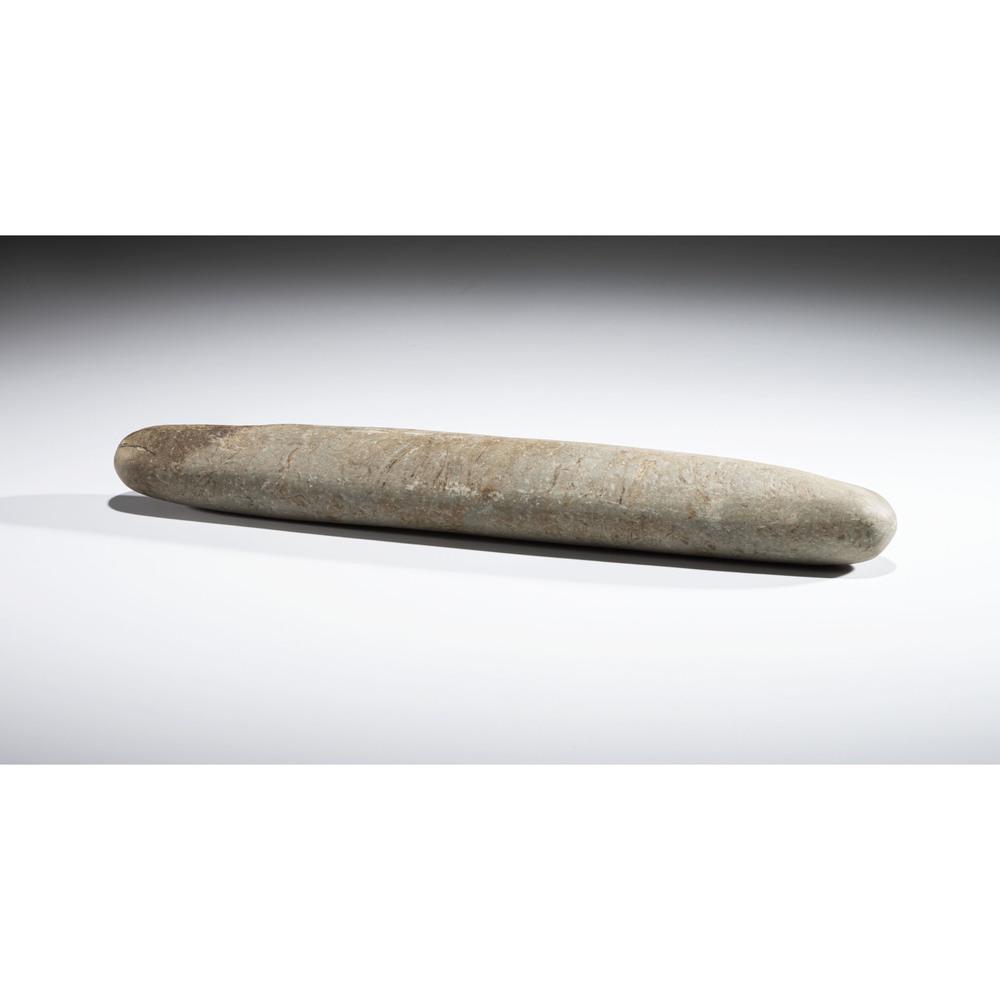 A Roller Pestle, 15-1/2 in.: Archaic Period, 8000-500 B.C. length 15-1/2 in. Published: Gerber, Art, The Art Gerber Story, 2007, pg. 167, fig. 0.107