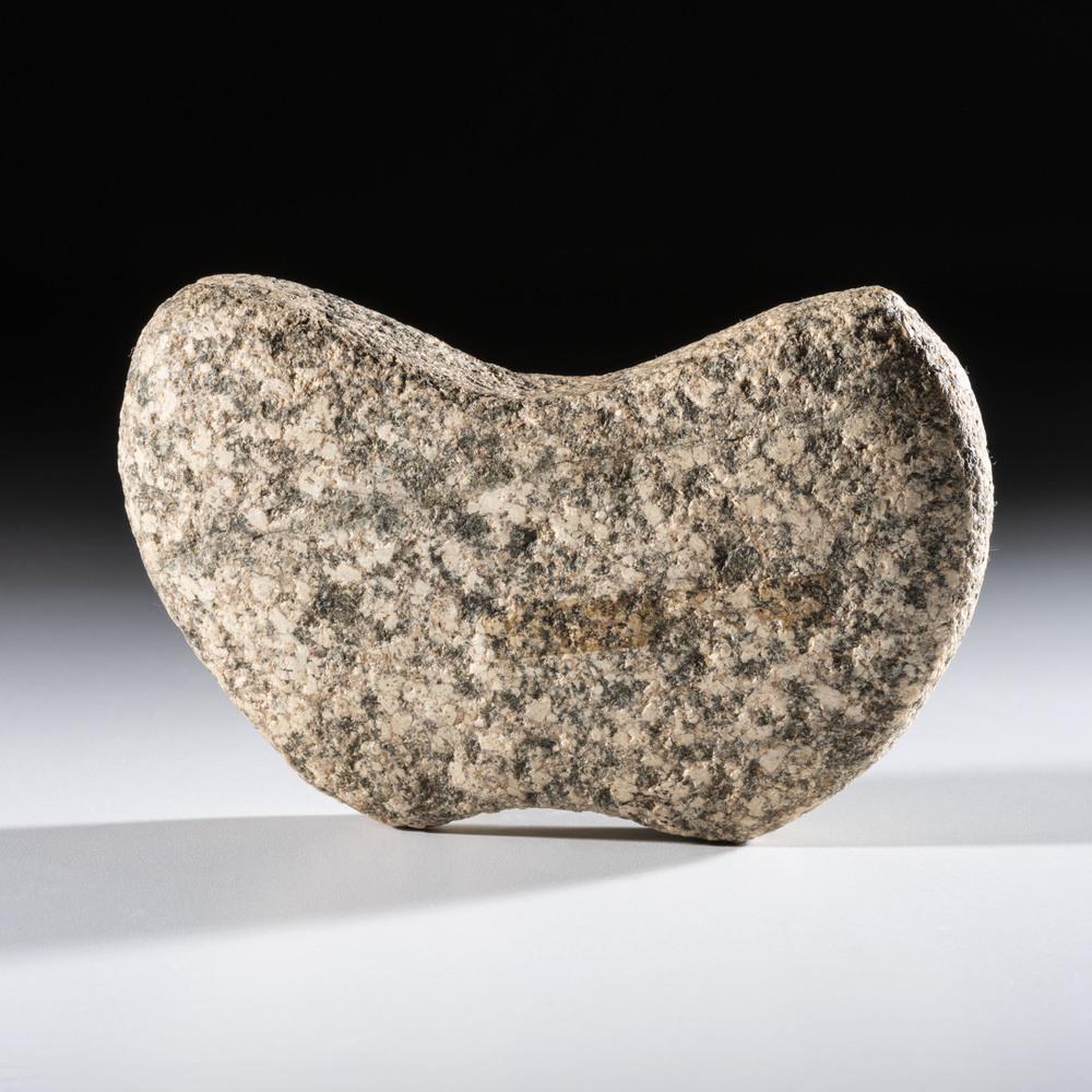 A Granite Wing Bannerstone Blank, 4-1/4 in.: Archaic Period, 8000-500 B.C. length 4-1/4 in. Collection History: Gerber Collection Number: AG.B82 Published: Gerber, Art, The Art Gerber Story, 2007, pg. 224, fig. 0.164