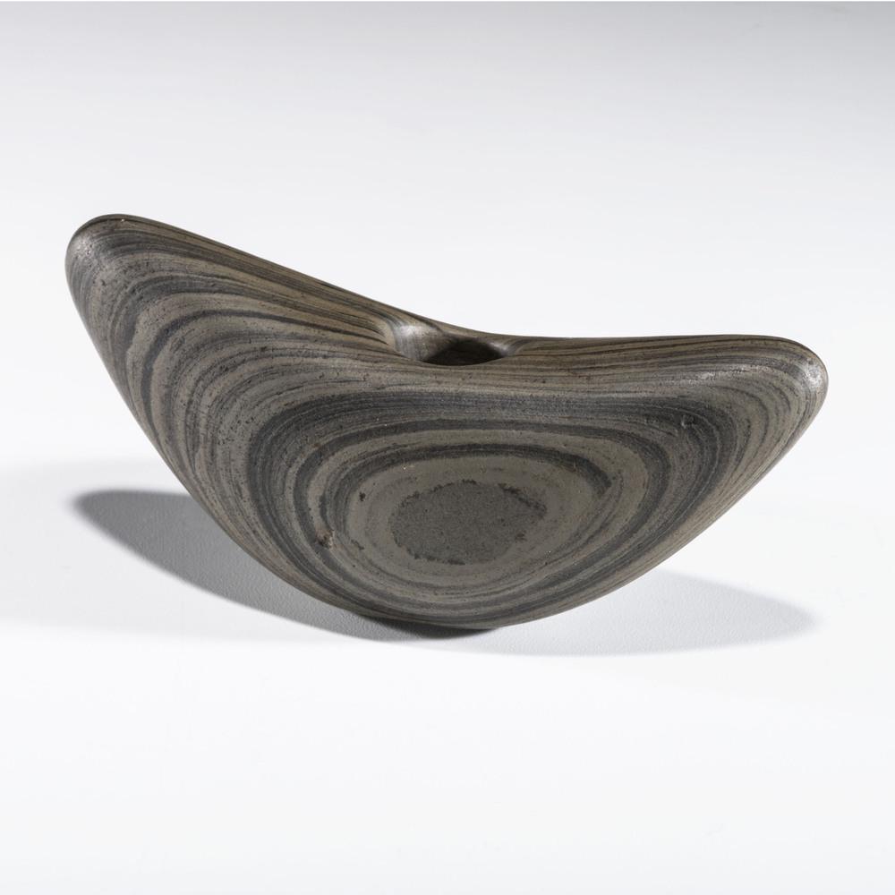 A Banded Slate Pick Bannerstone, 3-1/4 in.: Archaic Period, 8000-500 B.C. Wise County, Virginia length 3-1/4 in. Collection History: Gerber Collection Number: AG.B41 N.E. Carter Collection B.W. Stephens Collection, Quincy, Illinois Published: G
