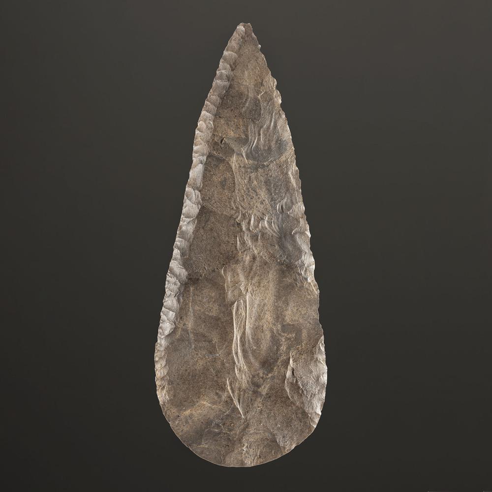 A Cobbs Blade, 5-3/4 in.: Middle Archaic, 8000-5000 B.C. length 5-3/4 in. Collection History: Gerber Collection Number: AG399 Published: Gerber, Art, The Art Gerber Story, 2007, pg. 368, fig. 0.308