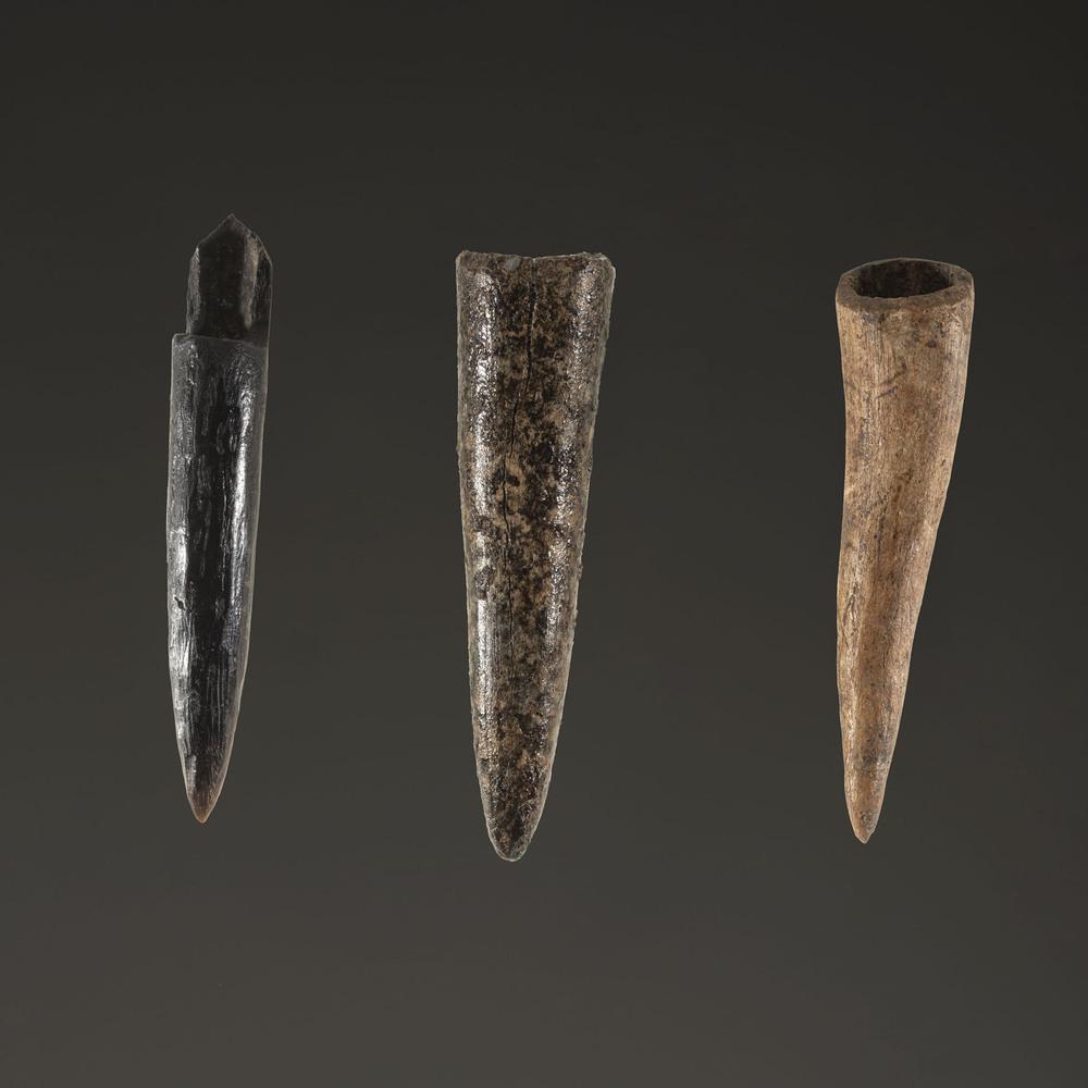 A Group of Three Bone Projectile Points, Largest 2 in.: Middle - Late Archaic Period, 8000-1000 B.C. lot of 3, longest 2 in.