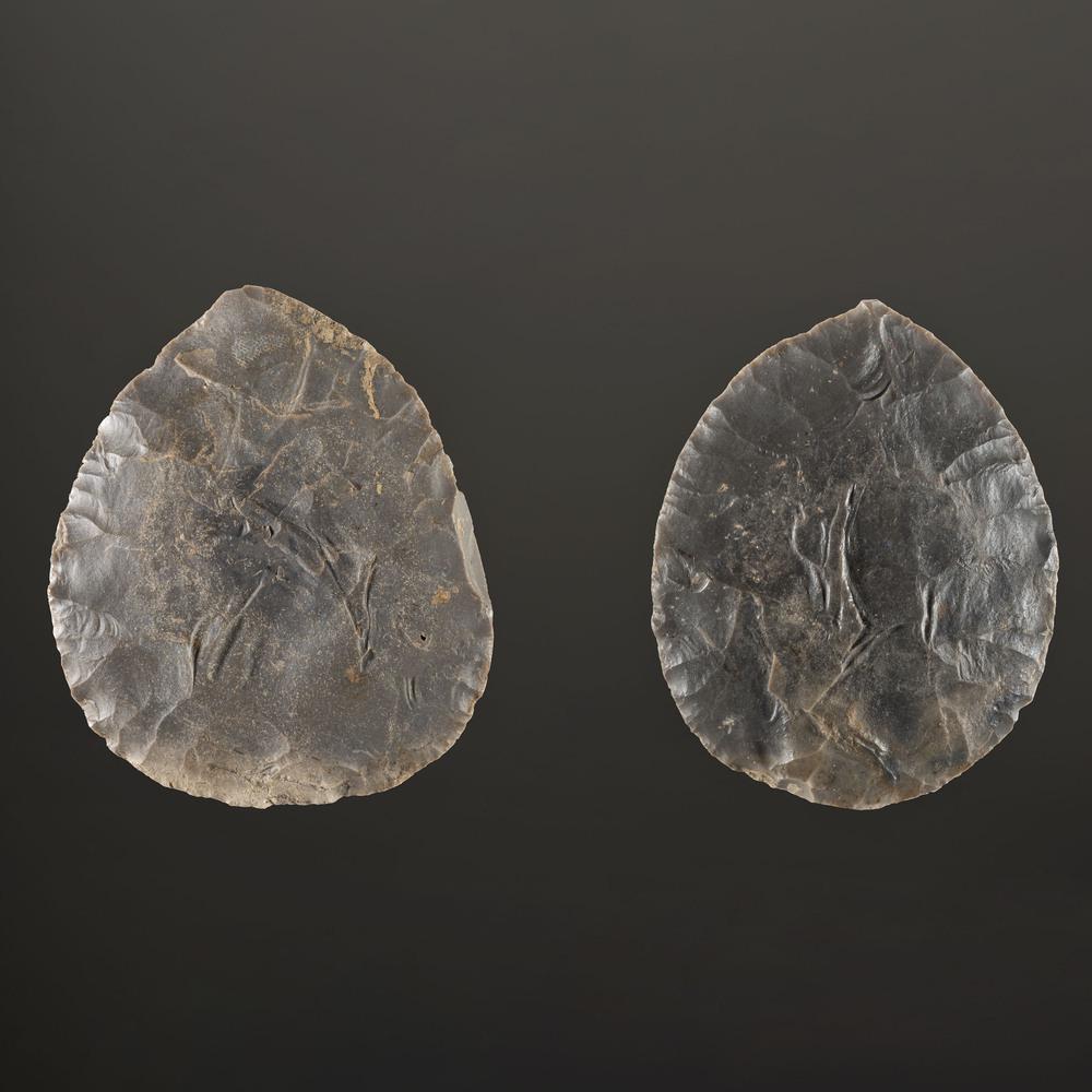 A Pair of Hornstone Cache Blades, Largest 4-5/8 in.: Hopewell Culture, Middle Woodland Period, 200 B.C. - A.D. 400 Geneva Bottoms, Kentucky lot of 2, longest 4-5/8 in. Collection History: Originally found by Larry Williams, in a cache of eleven blades.