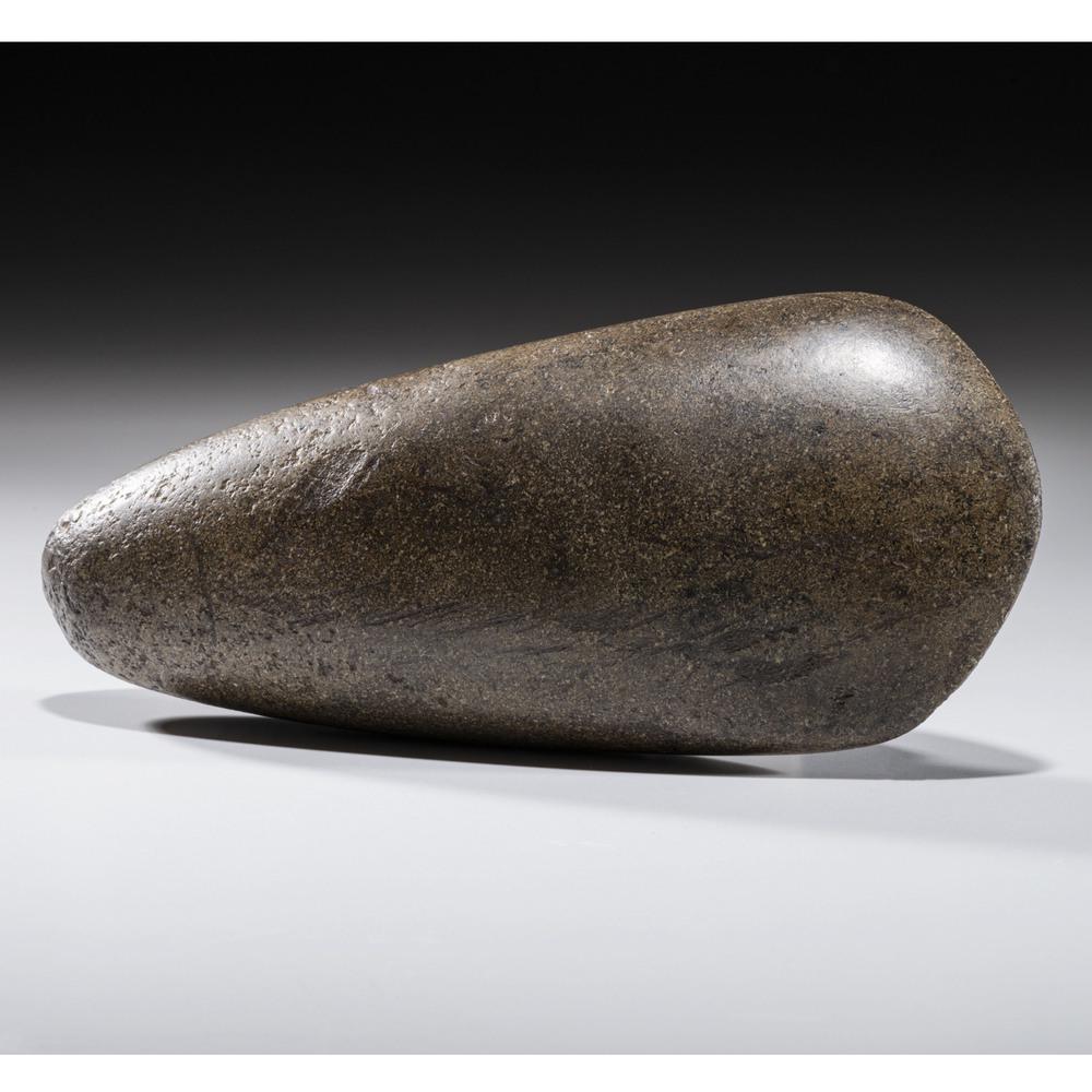 A Polished Granite Celt, 7-1/2 in.: Late Archaic - Woodland Period, 4000 B.C. - A.D. 1200 Jefferson County, Kentucky length 7-1/2 in. Collection History: Tom Fuller Collection