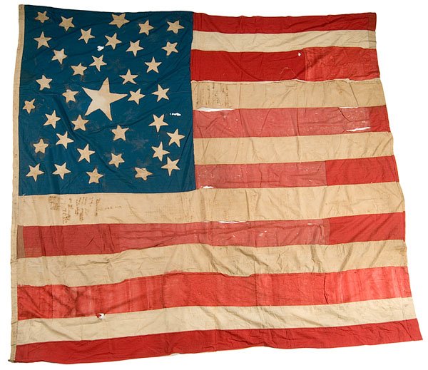 36-Star American Flag, from Grant to the Spanish A: 36-Star American Flag, from Grant to the Spanish American War, approx. 85" x 90" cotton; originally had sleeve hoist. Large central star; stars sewn on both sides of canton. Possibly started as a "G