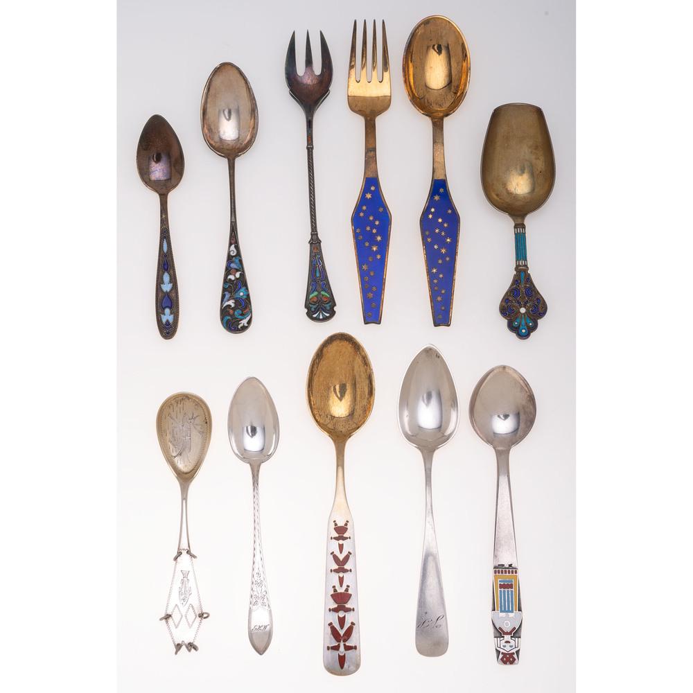 Fifteen Pieces of Russian and Danish Silver Flatware: Continental, 20th Century includes six silver spoons with enamel handles, a souvenir spoon and fork in fitted boxes by Worcester Silver Co., and seven demitasse spoons by various makers. Weight of 