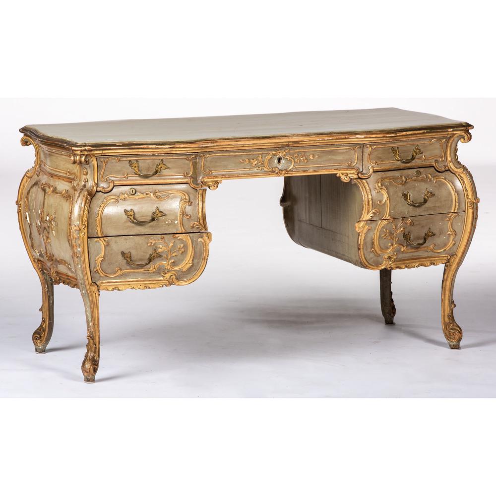 An Italian Rococo-style Painted and Parcel Gilt Desk: 19th/Early 20th Century Height 30 3/4 x width 56 x depth 25 inches.