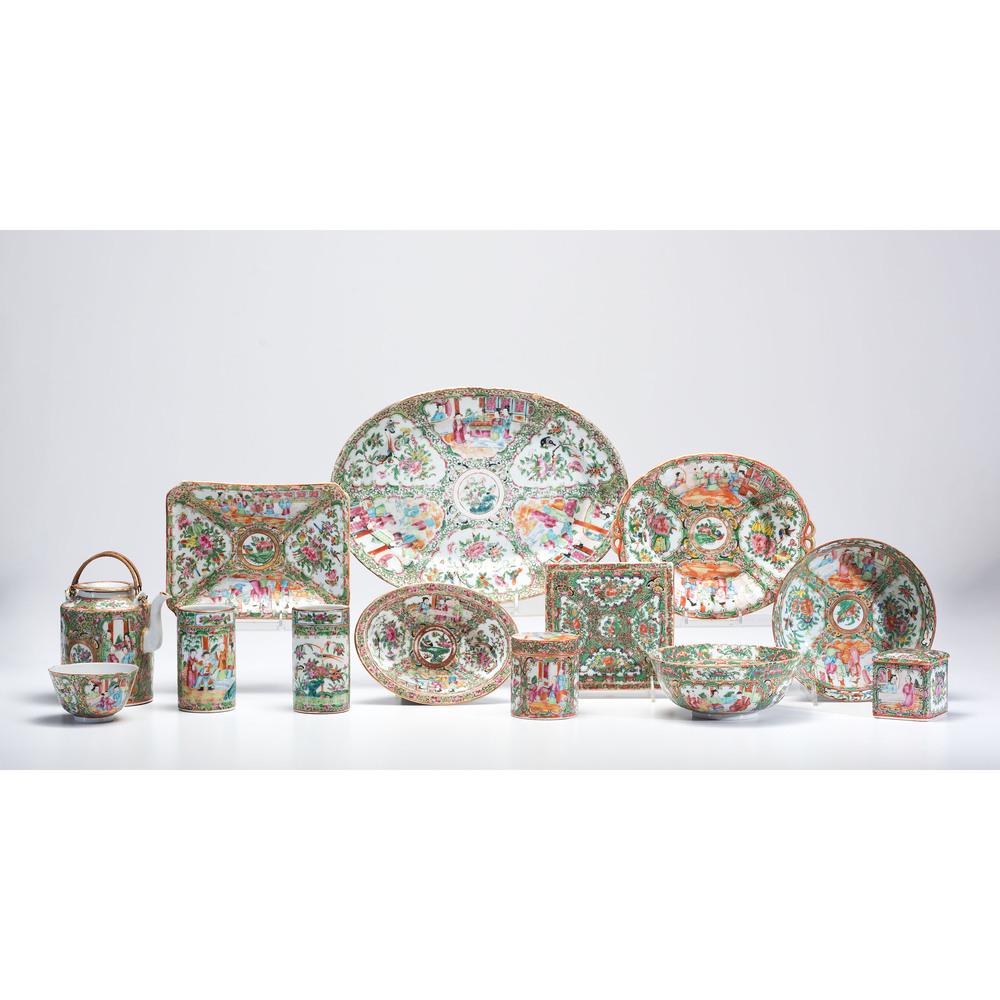 A Group of Chinese Export Rose Medallion Porcelain: 19th/20th Century comprising two saucers, three teapots, one lidded sugar bowl, one cream pitcher, three bowls, two octagonal plates, two scalloped rim plates, three dishes, one trivet, two lidde