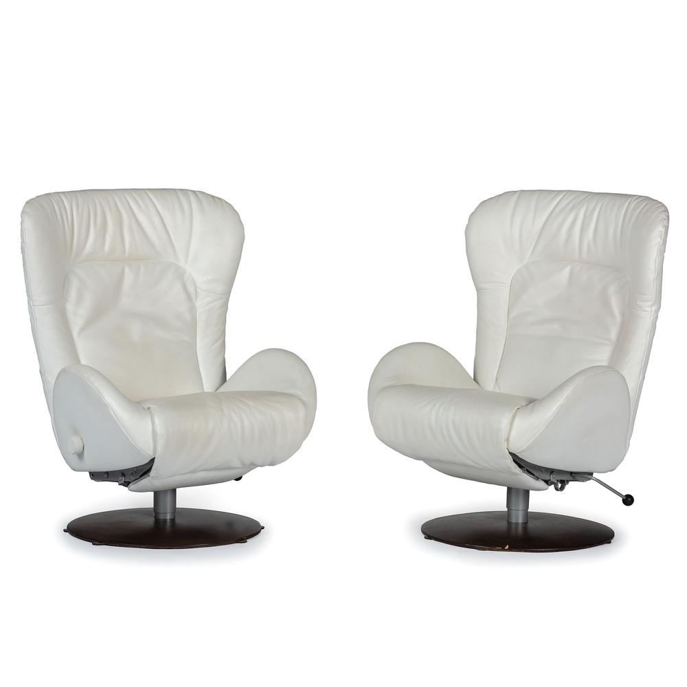 A Pair of White Leather Contemporary Recliners: 20th Century Height of each 41 1/2 x width 29 1/4 x depth 28 inches.