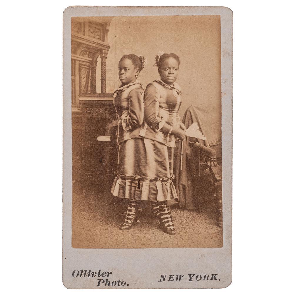 [MUSIC] -- [McKOY, Millie and Christine (1851-1912)].: [MUSIC] -- [McKOY, Millie and Christine (1851-1912)]. Two CDVs of "Carolina Twins" Millie and Christine, comprising: OLLIVIER, Horace (1854-1921). The Carolina Twin, Surnamed the 2-headed Nightingale