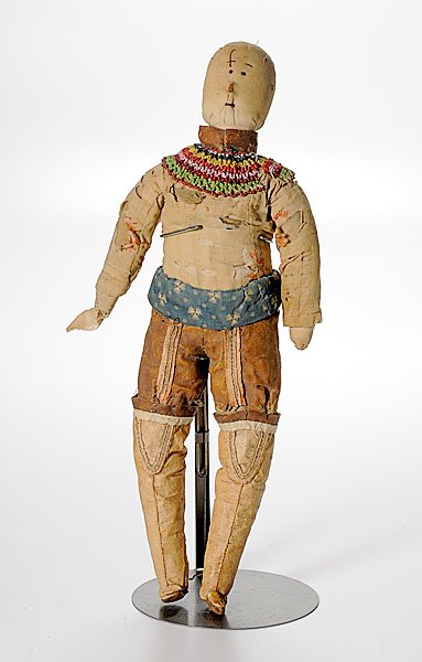 Greenland Eskimo Doll, : Greenland Eskimo Doll, composed of cloth body and head; embroidered hide boots augmented with dyed seal gut; beaded yoke, length 21". early 20th century