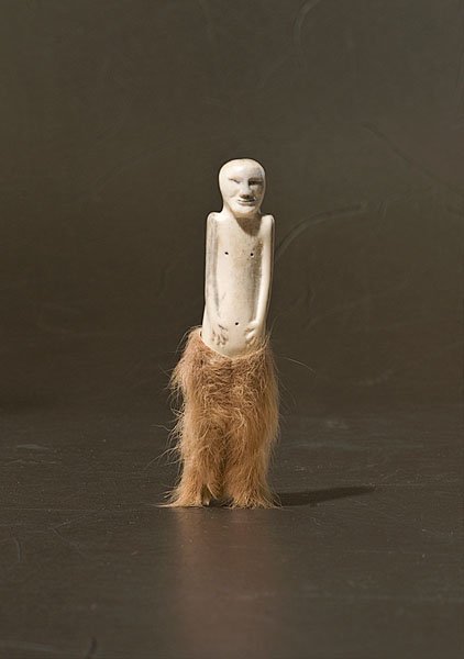 Eskimo Doll : Eskimo Doll carved of bone with inked features; seal fur pants; length 5.5". ca 1900