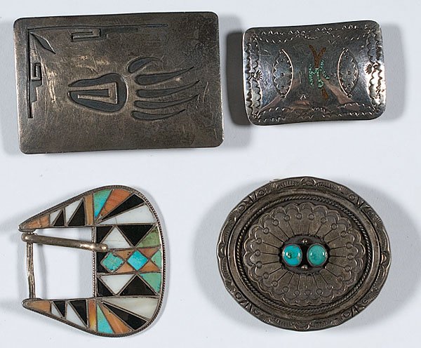 Group of Southwestern Belt Buckles : Group of Southwestern Belt Buckles lot of 4, includes a Navajo belt buckle with hallmark of a medicine man's dipper, the signature for Willie Yazzie, Jr. & Sr., length 3" x 1.9"; PLUS a Navajo oval 