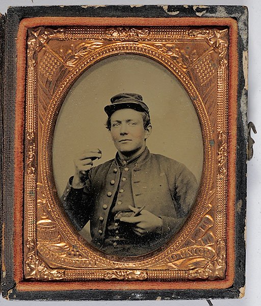Unusual Ninth Plate Ambrotype of Tobacco Chewing P: Unusual Ninth Plate Ambrotype of Tobacco Chewing Private, an unidentified private presents two fingers of tobacco as he prepares to indulge in a chew. No name or unit identification but great animat