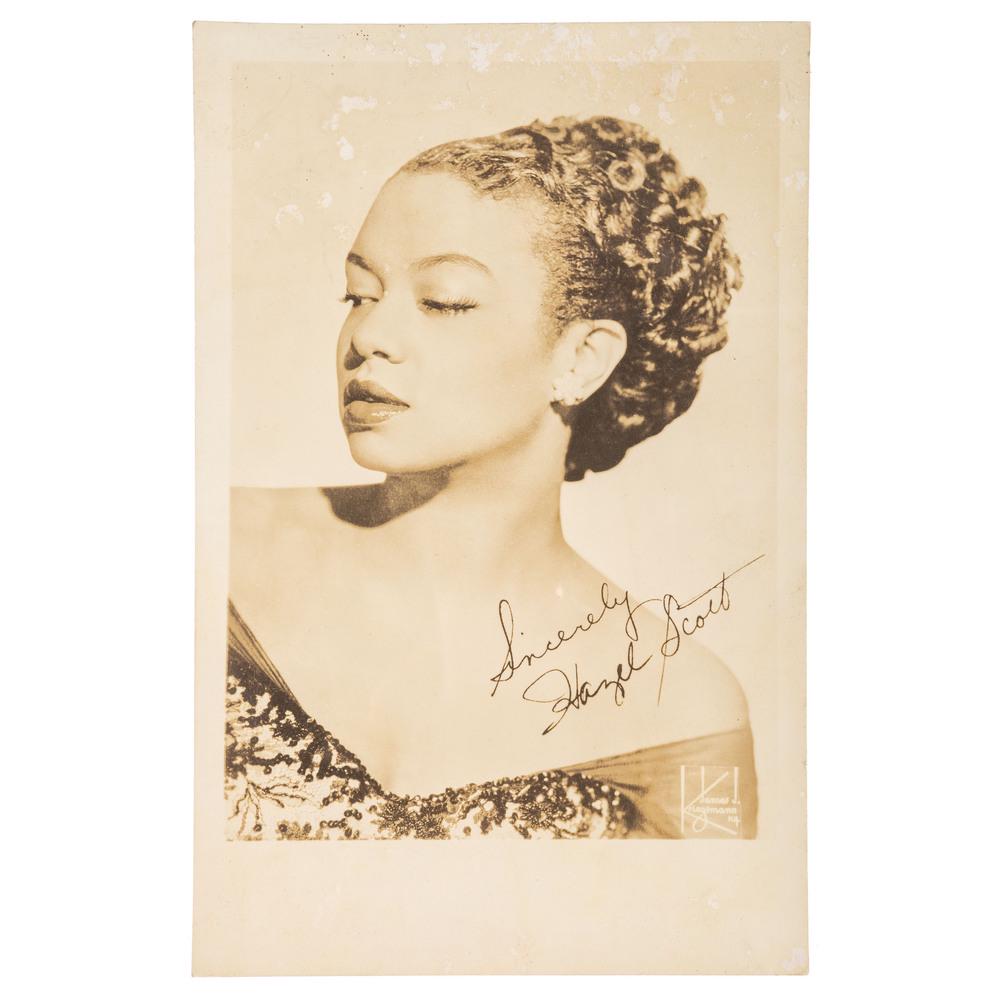 [MUSIC]. SCOTT, Hazel (1920-1981). Autographed: [MUSIC]. SCOTT, Hazel (1920-1981). Autographed photograph ("Hazel Scott"). 5 x 7 3/4 in. silver gelatin photograph. New York: James J. Kriegsman, n.d. (even toning, scattered surface abrasions throug