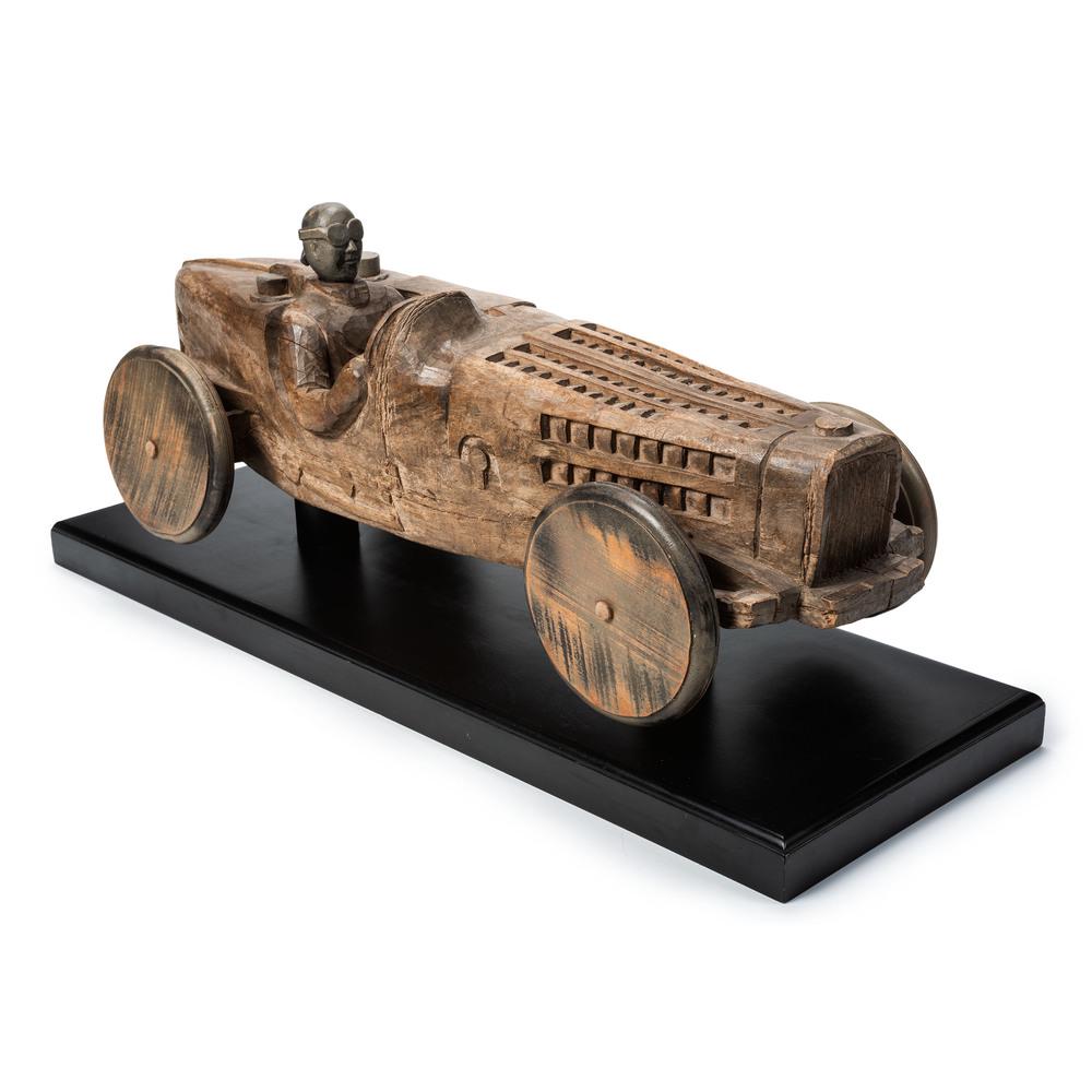 A Carved Wood Stock Car, Circa 1950: A Carved Wood Stock Car, Circa 1950 Length 28 3/4 inches. Provenance: Harvey Antiques, Evanston, Illinois Property from the Collection of Paul M. Bentley, Oostburg, WIPaul Bentley was a lifelong colle