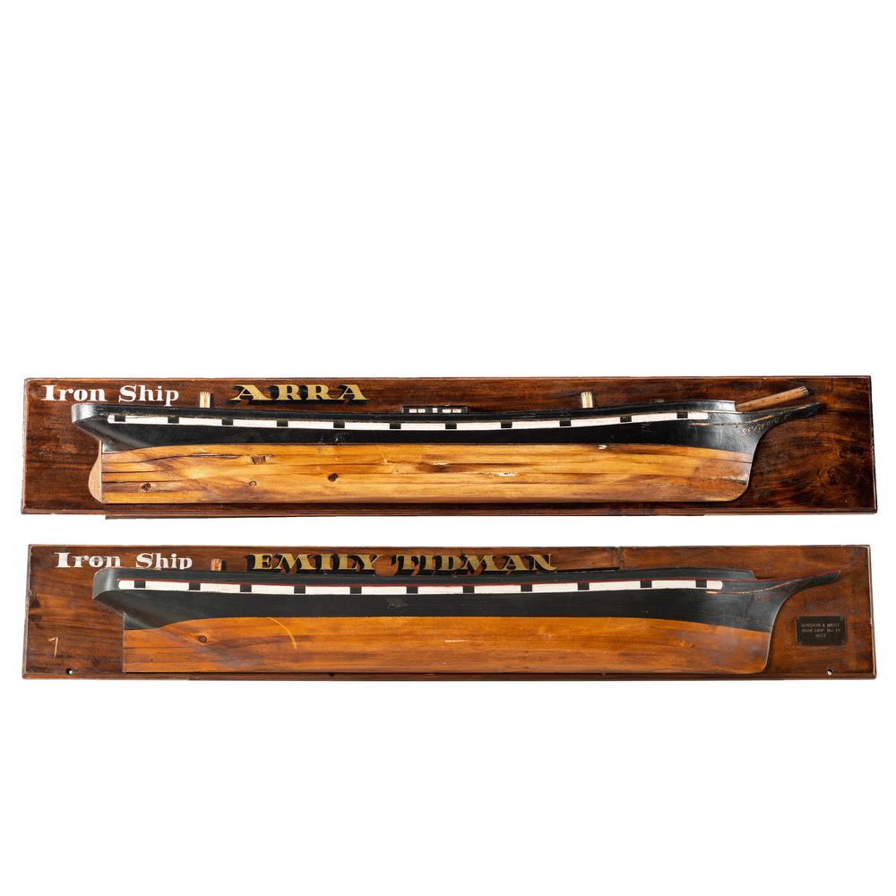 Two Carved and Gilt Wood Ironship Half Hull Models...: Two Carved and Gilt Wood Ironship Half Hull Models: Arra and Emily Tidman 20th Century Length of each 57 inches. Provenance: Port Antiques, Port Washington, Wisconsin Property from the Collection of P