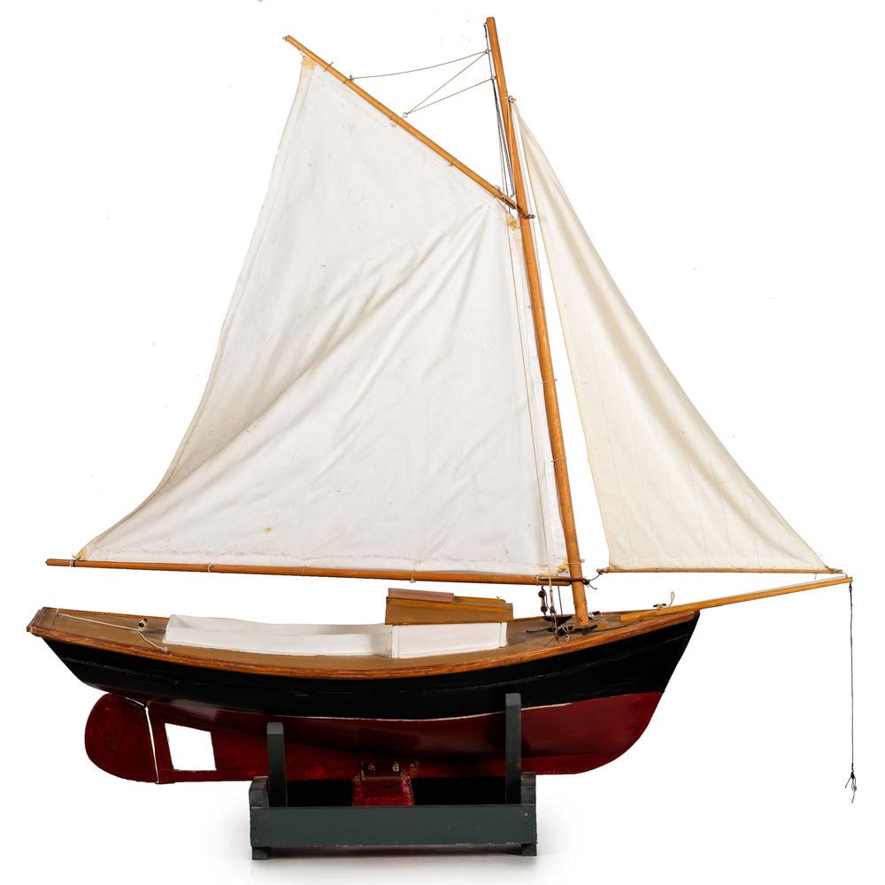 A Carved and Painted Wood Ship Model: A Carved and Painted Wood Ship Model Height on stand 42 inches, overall length 42 inches. Property from the Collection of Paul M. Bentley, Oostburg, WIPaul Bentley was a lifelong collector of idiosync
