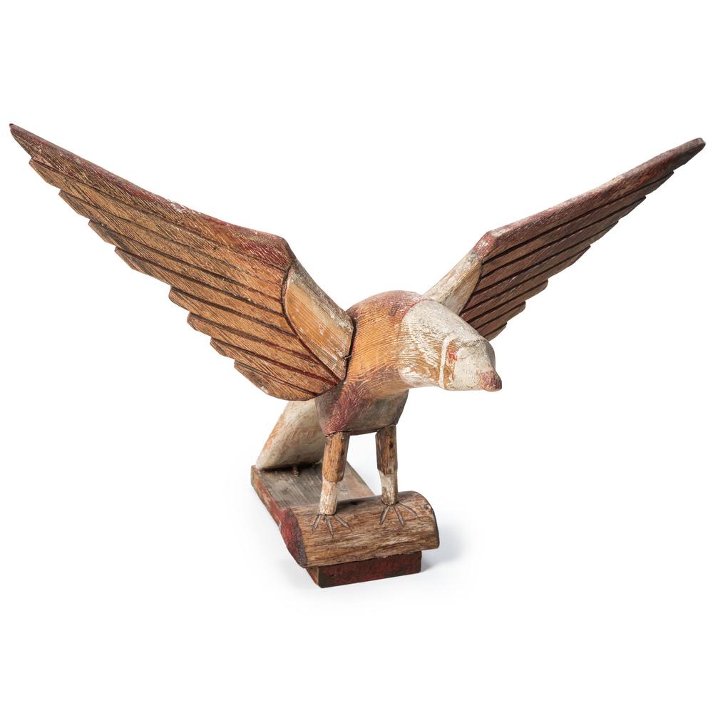 A Carved and Painted Wood Eagle by Albert Zahn: A Carved and Painted Wood Eagle by Albert Zahn (American, 1864-1953) unmarked. Height 13 3/4 x width 22 inches. In the early 1970s, Paul acquired this Zahn Eagle from his parents' neighbor during a su