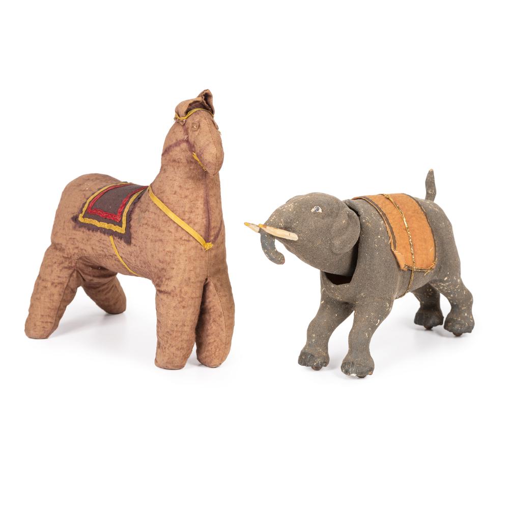 An Elephant Nodder and Stuffed Horse: An Elephant Nodder and Stuffed Horse Late 19th/Early 20th Century Height of horse 9 1/2 inches. Height of elephant 6 1/4 inches. Property from the Estate of James A. Sanders, Evansville, IndianaHindma