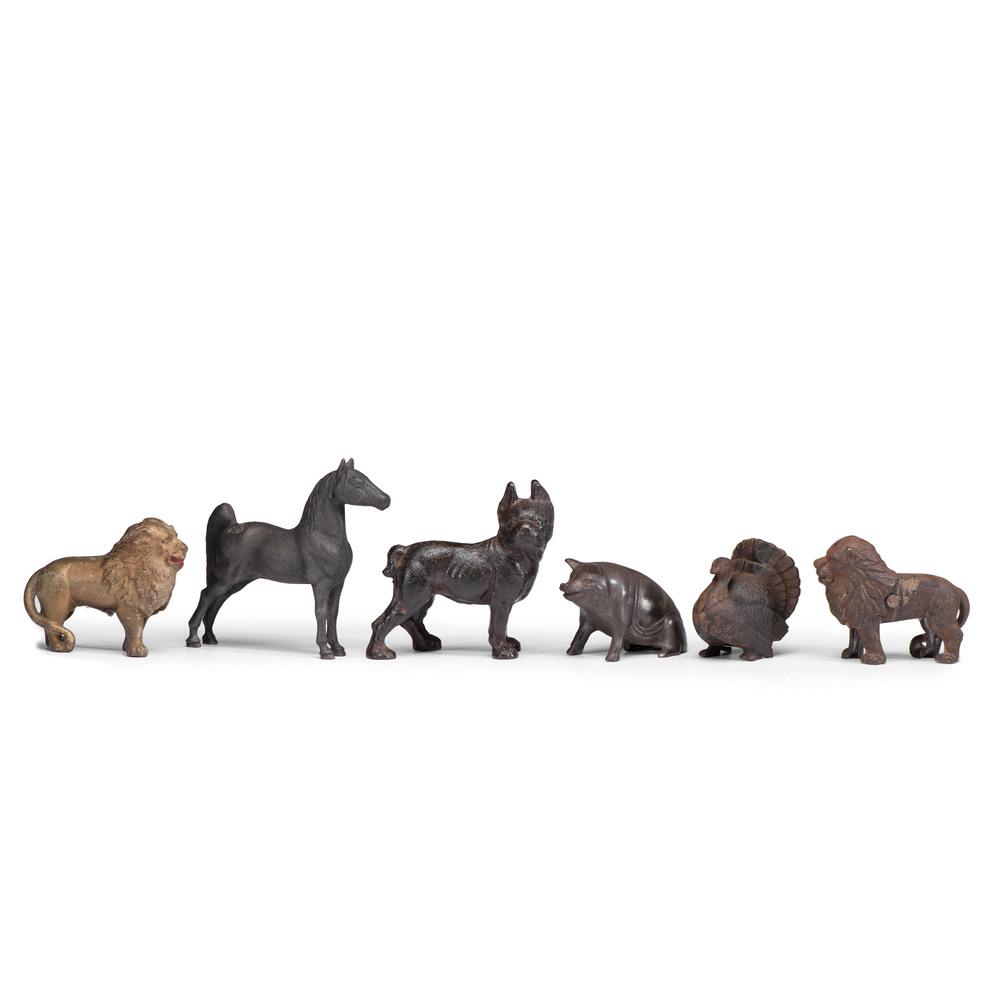 Six Cast Iron Animal Still Banks: Six Cast Iron Animal Still Banks American, 20th Century including two lions, one horse, one dog, one pig, and one turkey. Height of largest 6 x length 4 inches. Property from the Estate of James A. Sa