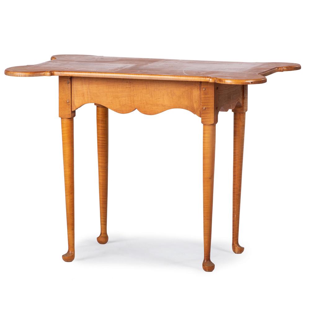 A Queen Anne Style Tiger Maple Porringer Top Tavern: A Queen Anne Style Tiger Maple Porringer Top Tavern Table 20th Century Height 26 1/2 x width 35 1/2 x depth 22 inches. Property from the Estate of James A. Sanders, Evansville, IndianaHindman is honor