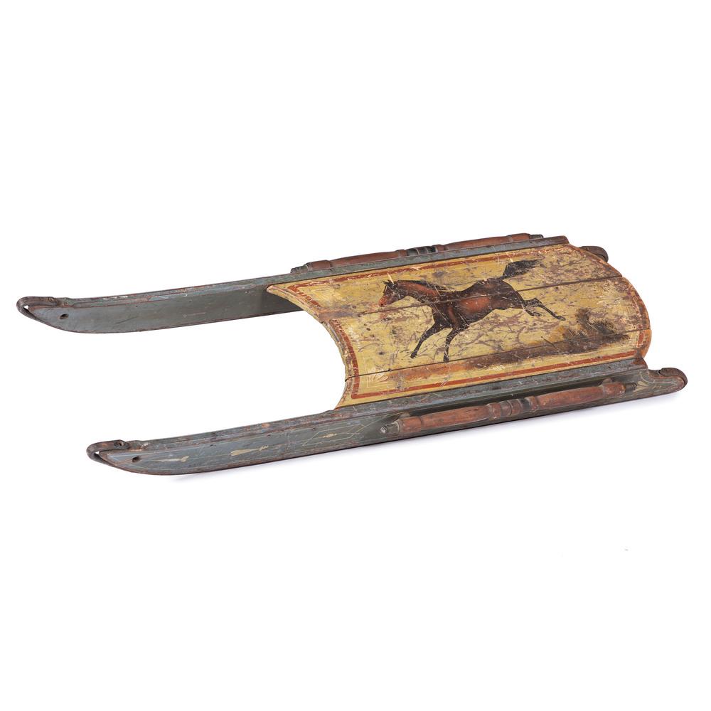 A Wooden Child's Sled with Painted Horse Decoration: A Wooden Child's Sled with Painted Horse Decoration American, 19th/Early 20th Century with iron mounted runners. Length 45 x width 14 inches. Property of the late Karen Tosterud, Bellaire, Michigan We
