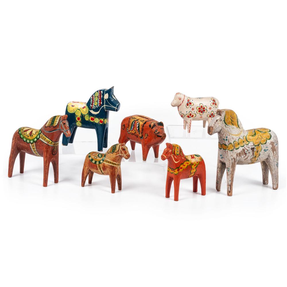 Five Swedish Dala Horses and Two Banks: Five Swedish Dala Horses and Two Banks includes five horses with traditional floral and bridle paint decoration, one sheep and one pig bank. sheep marked Soldtacka to underside of body, pig signed Mor