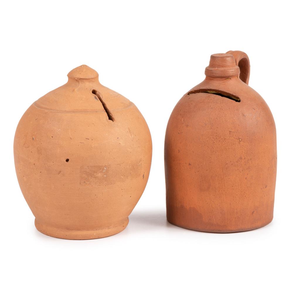 Two Pennsylvania Unglazed Redware Banks: Two Pennsylvania Unglazed Redware Banks 19th Century unmarked. Height of larger 4 1/2 inches. Property from the Arizona State University Art MuseumThe ASU Art Museum recognizes the special responsibil