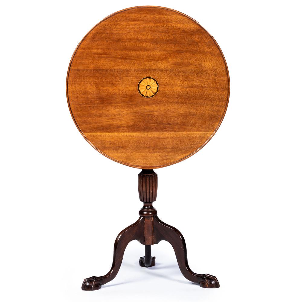 A Late Chippendale Style Marquetry Decorated Mahogany: A Late Chippendale Style Marquetry Decorated Mahogany Dished and Tilt-Top Tea Table 20th Century, incorporating earlier elements Height 29 x width 23 1/4 x depth 23 1/4 inches. Property from the Coll