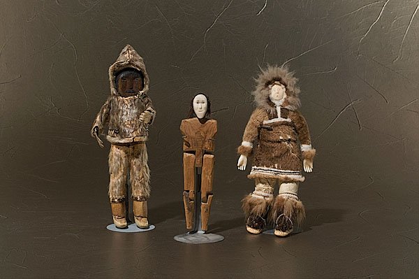 Eskimo Dolls : Eskimo Dolls, lot of 3, includes one doll with carved and darkened wood features; seal hide parka and walrus boots, length 9.75"; PLUS a doll made with a wooden articulated body and bone face, length 