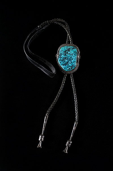 Tim Yazzie Navajo Bolo with Large Kingman Stone : Tim Yazzie Navajo Bolo with Large Kingman Stone, signed Tim Yazzie Navajo and handcrafted with highly detailed sterling tips, height 2.75" x width 2.2" mid- to late 20th century