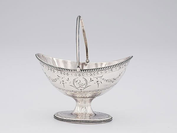 Hester Bateman Silver Sugar Basket, : Hester Bateman Silver Sugar Basket, English, mark of Hester Bateman, London, 1785, with incuse duty mark of bust facing left. Oval form with swing handle on a conforming base with beaded rim, the bo