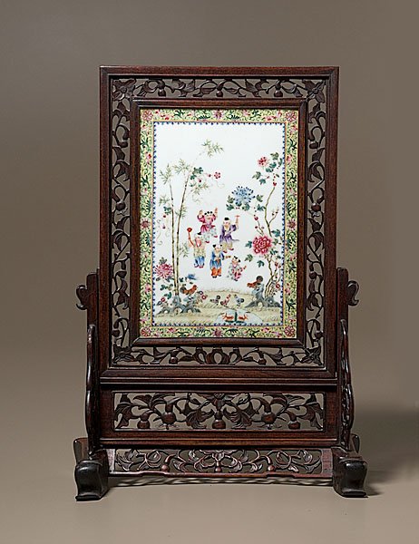 Chinese Porcelain Scholar's Screen on Stand, : Chinese Porcelain Scholar's Screen on Stand, Chinese, 19th century, a scholar's table screen on a pierced and carved stand, the central porcelain tablet enameled in famille rose palette, depicting c