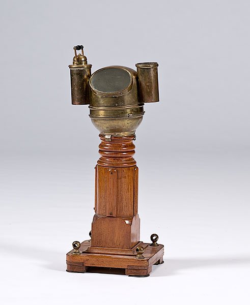 Negus New York Binnacle, : Negus New York Binnacle, American, ca 1920-40. A Negus ship's binnacle, gimbal mounted in a brass compass bonnet with whale oil lamps on sides. Varnished wood case. Compass card by Ritchie, ring mar