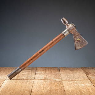 Eastern Woodlands Pipe Tomahawk, with Decorated Blade: tulip-shaped bowl and beveled molding attach to a forged steel head; with one side inlaid with brass depicting a sun and crescent moon, opposite with a copper tree surmounted by the initials OC, a