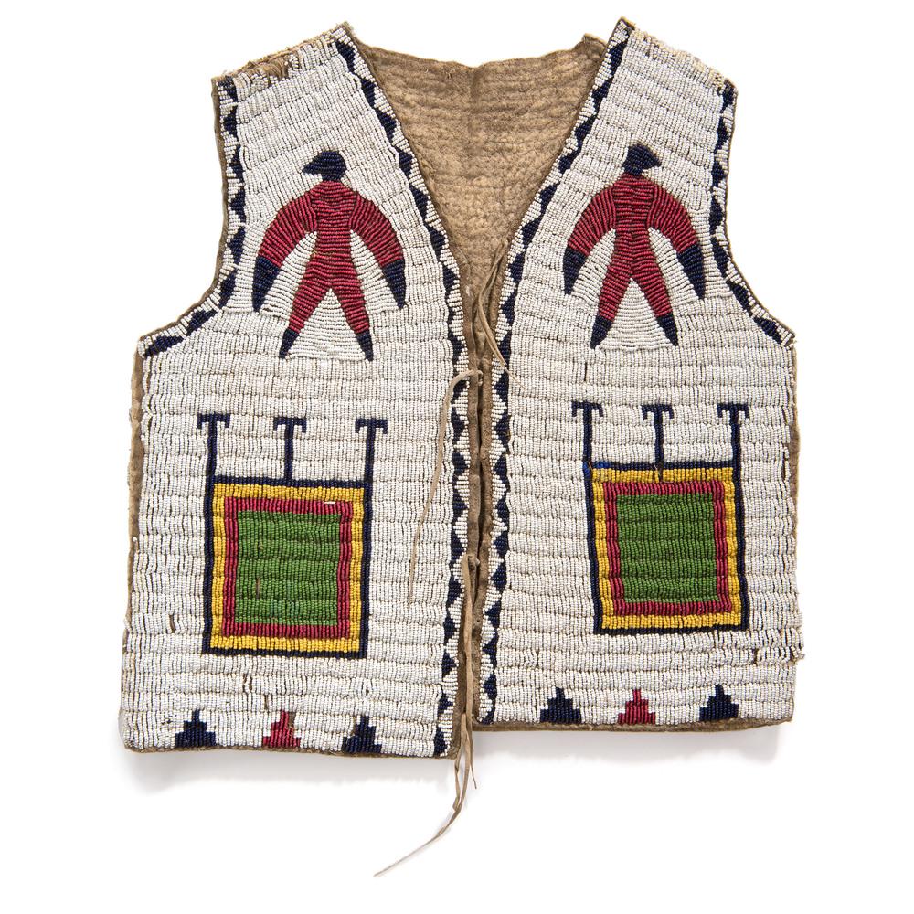 Sioux Child's Beaded Buffalo Hide Pictorial Vest: thread and sinew-sewn; beaded using colors of cobalt, red white-heart, greasy yellow, pea green, and white; front of vest designed with two Thunderbirds and nesting blocks; reverse of vest has two la