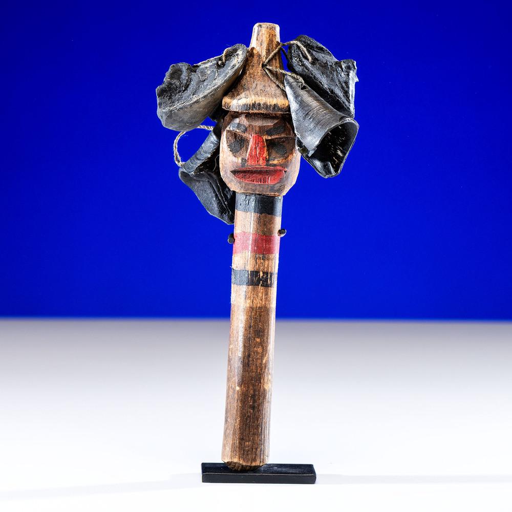 Northwest Coast Painted Rattle, From the Collection of: painted in red and black, carved in the form of a human figure; dew claw rattles height 7.25 in. late 19th century Provenance: From the Collection of Dick Jemison, Alabama