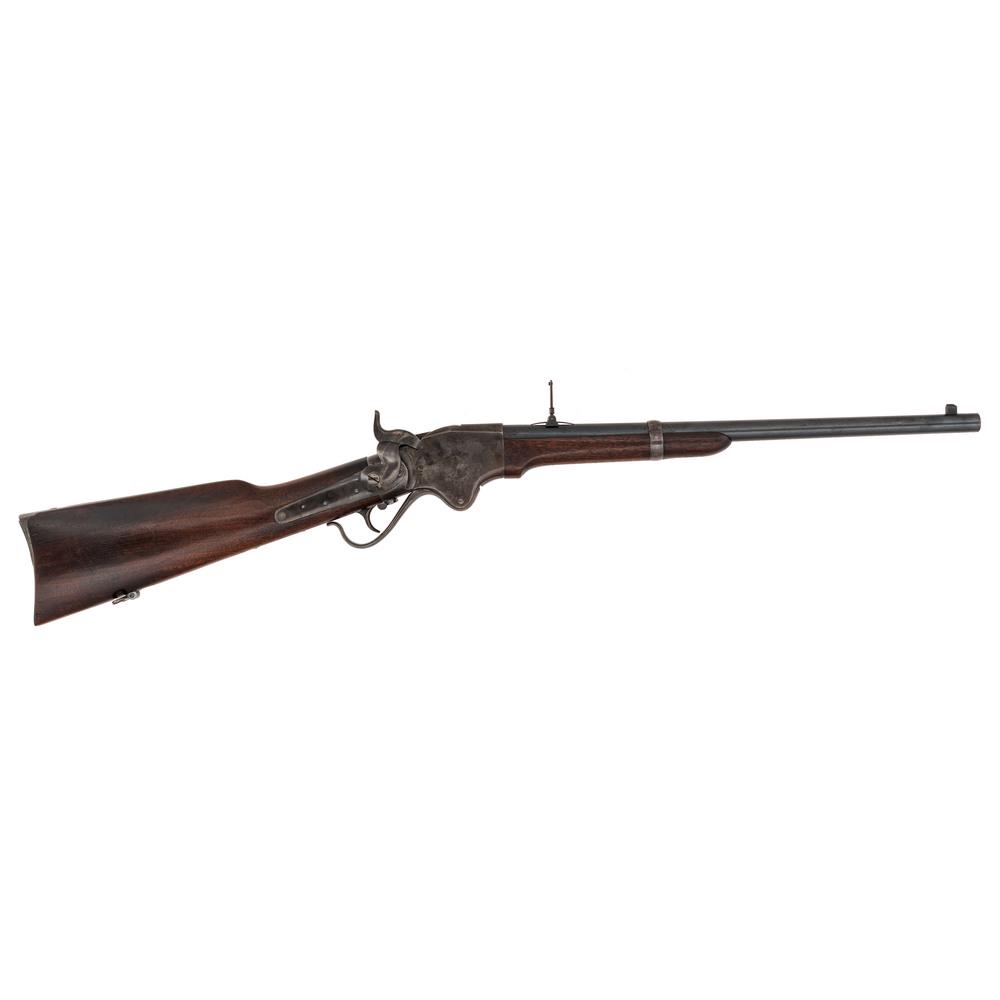 US Model 1865 Spencer Carbine: .56-50RF caliber, 20" barrel, S/N 9840. Blued barrel and color case hardened receiver, smooth walnut stock and forend secured by a single barrel band. Standard Spencer receiver markings, M1865 barrel 