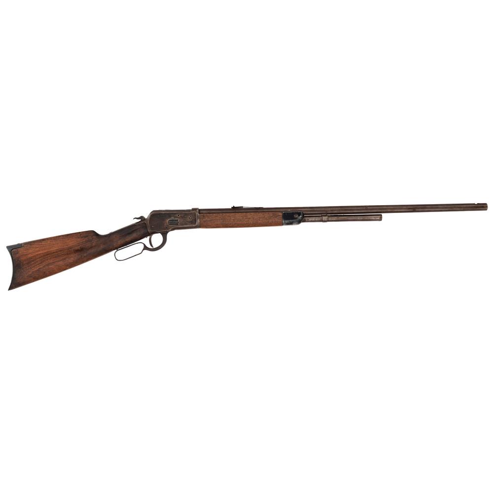 Winchester Model 1892: Unknown caliber, 28" barrel length, S/N 21969 (mfg. 1892). Lever-action rifle with tube fed magazine, adjustable rear sight, side extractor, and forearm cap. Rich patina to octagonal barrel and receiv
