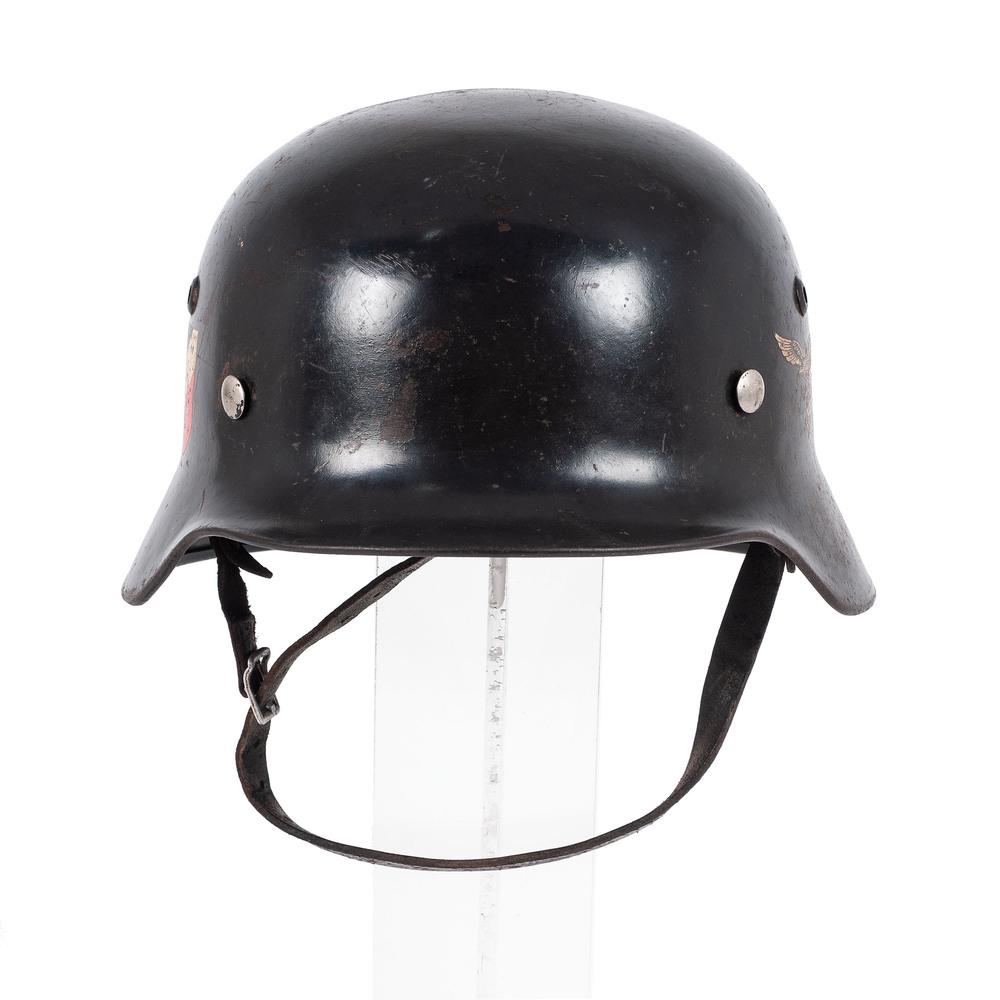 WWII Double Decal Luftwaffe Helmet: Model 1935 helmet retaining 80% smooth blue-gray finish with 90% of the eagle decal on the left side and 85% of the national colors shield on the right. Interior complete with liner and chin strap, 