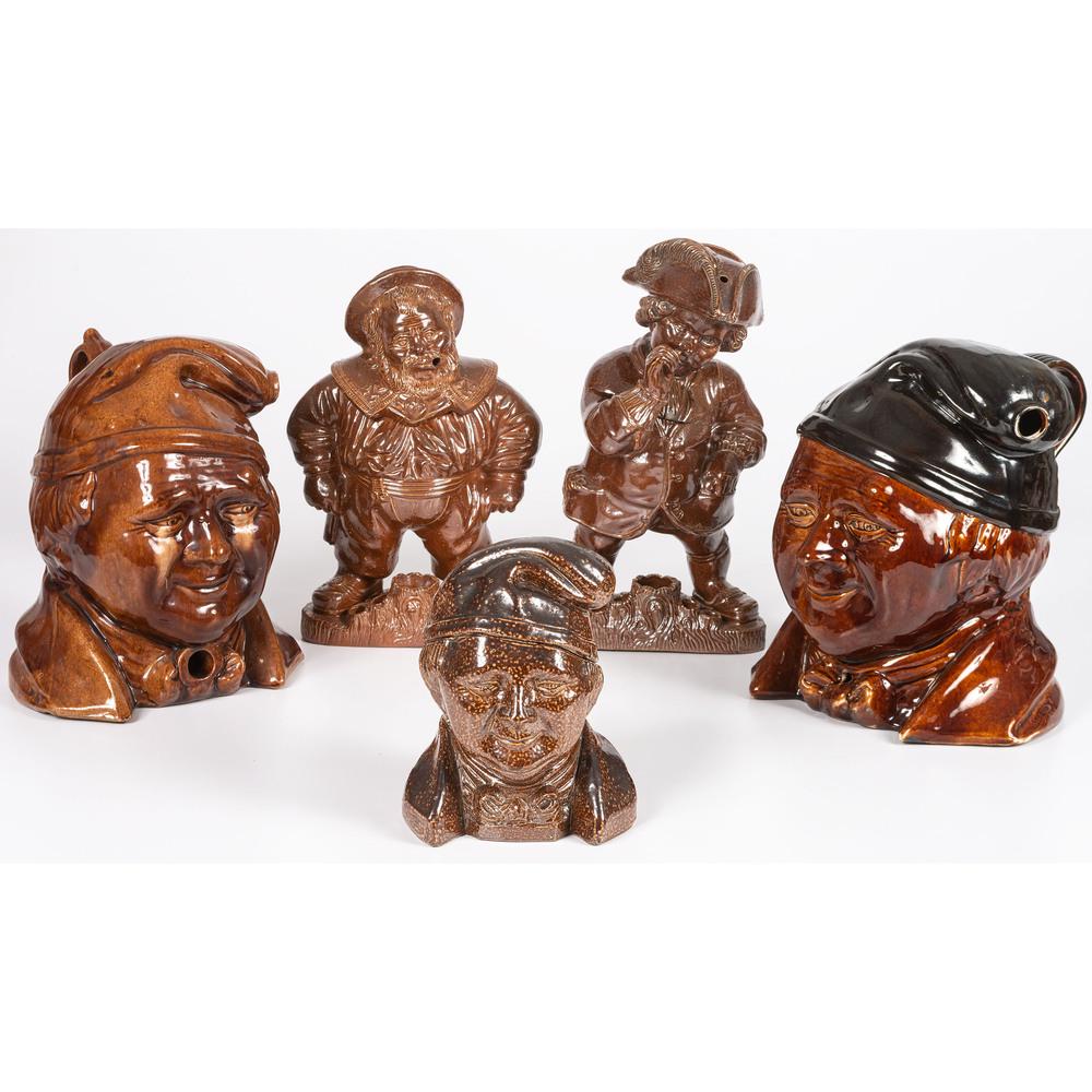 Five Figural Stoneware Tobacco Jars in Dark Brown Glaze: English, 19th/20th Century Height of largest 11 inches. Provenance: Property from the Estate of James A. Sanders, Evansville, Indiana Hindman is honored to present property from the Estate of James 