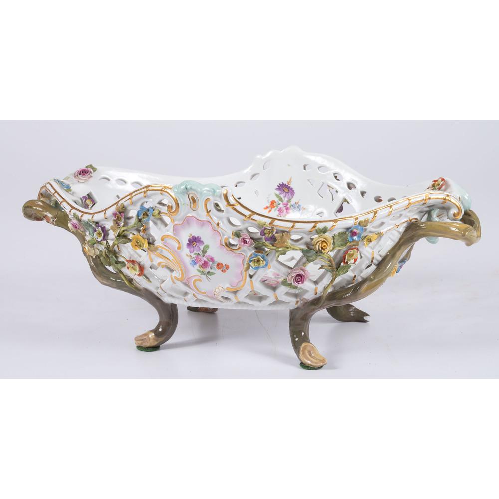 A Meissen Porcelain Centerpiece Basket: 19th Century Height 5 7/8 x length 15 x depth 9 inches. Provenance: Property from Brown Brothers Automotive formerly Brown Brothers Cadillac, Louisville, Kentucky