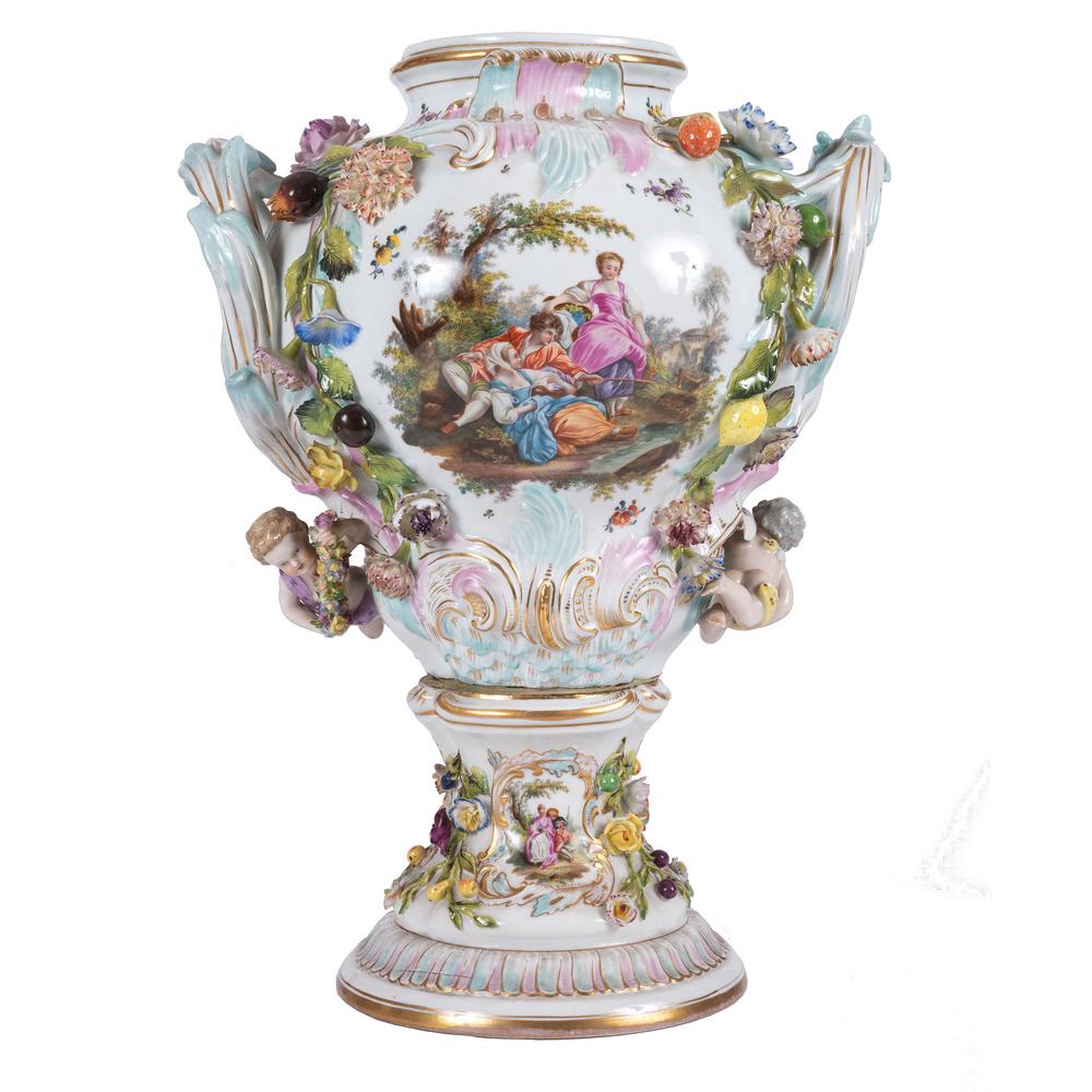A Carl Thieme Porcelain Urn: 19th Century with mark to underside of base. Height 18 inches. Provenance: Property from Brown Brothers Automotive formerly Brown Brothers Cadillac, Louisville, Kentucky