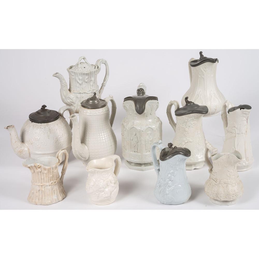 Eleven Staffordshire Salt Glaze and Ironstone Pitchers: 19th Century Height of largest 8 1/2 inches. Provenance: Property from the Estate of James A. Sanders, Evansville, Indiana Hindman is honored to present property from the Estate of James A. Sanders, i