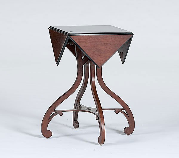 Baker Drop Leaf Tea Table : Baker Drop Leaf Tea Table A late-20th century, mahogany handkerchief top tea table, by Baker Furniture, with four drop-leaf corners, s-curve legs with pierced x-stretcher; ht. 26, wd. 16 (leaves dow